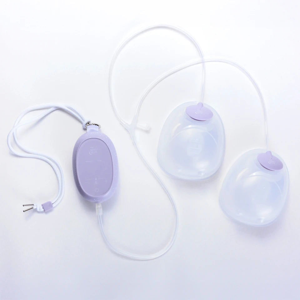 Double electric breast pump with tubing