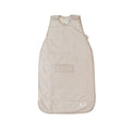 A baby sleep sack in a light beige color with a subtle Maori designed wavy pattern, featuring a front patch pocket and a small brand label near the bottom right corner.