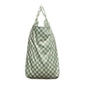 Green and white checkered large nestling wet bag on a white background