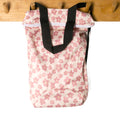 Large Swim Wet Bag in an pink floral print on a white background