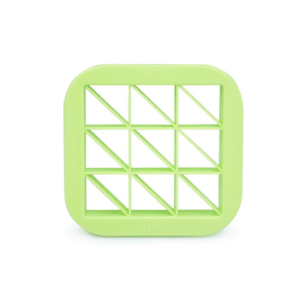 Green square-shaped kitchen tool with a grid pattern on a white background