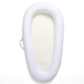 White baby bassinet nest bed on a white background