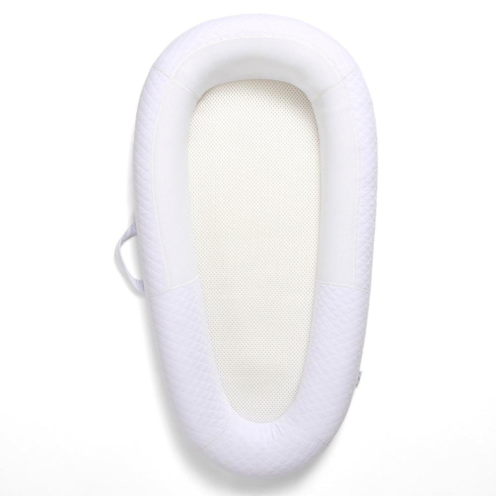 White baby bassinet nest bed on a white background