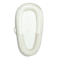 Sage green baby nest with mesh base on a white background