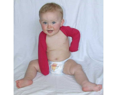 Baby wearing pink mitten sleeves against white background.