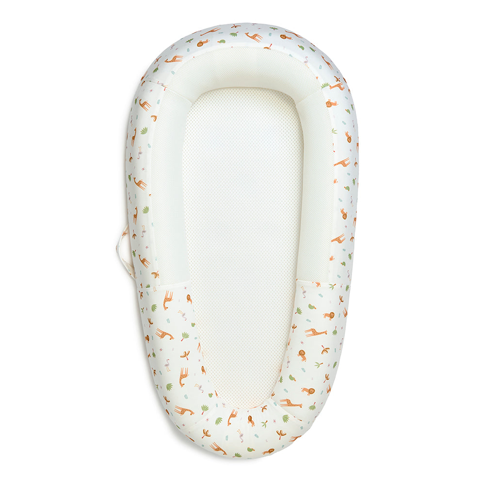 Baby nest with mesh base and animal pattern on a white background